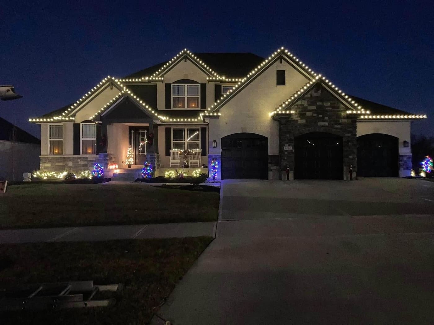 Three-car frontage run in one clean line of warm white lights